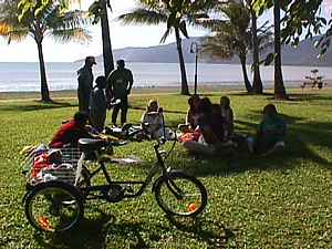 The last day of the July 2001 Gathering is held on the public esplanade at Cairns. Attendees link with other local grassroots networks.